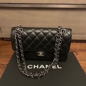 Black small classic Chanel handbag